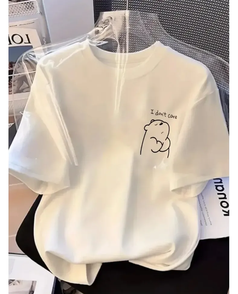 Kadın T-Shirt Kısa Kollu, bisiklet Yaka, Eğlenceli Karikatür Ayı ve "Umrumda Değil" Baskı - Beyaz